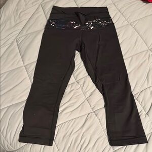 Lululemon Athletica Cropped Black and Purple Leggings